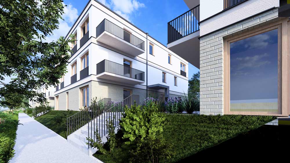 Eckansicht des modernen Wohngebäudes im Quartier Am Kliff mit Balkonen und grüner Umgebung unter blauem Himmel