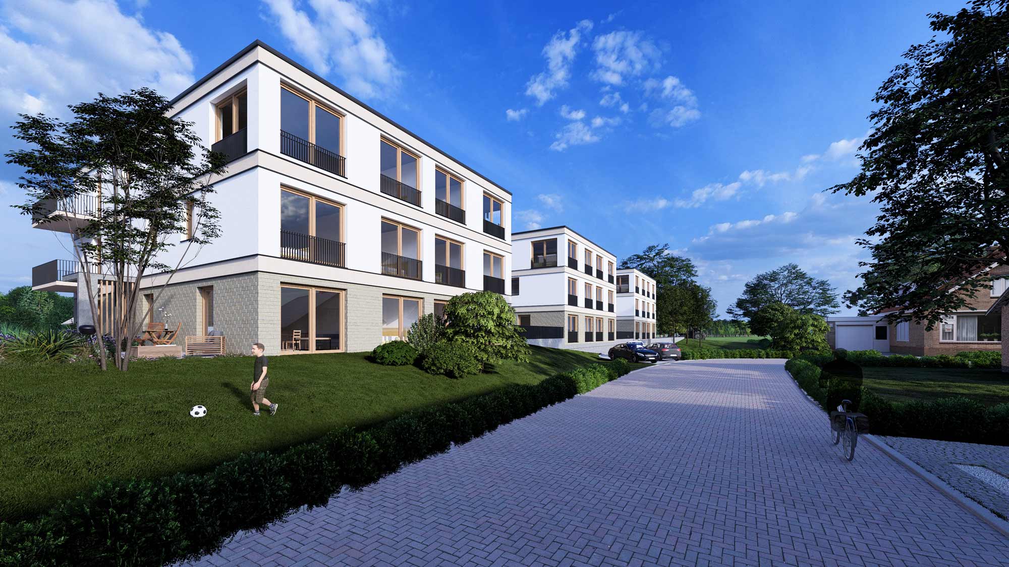 Moderne Wohngebäude des Quartier Am Kliff in Glowe, Rügen, mit großen Fenstern und Balkonen, umgeben von grüner Landschaft